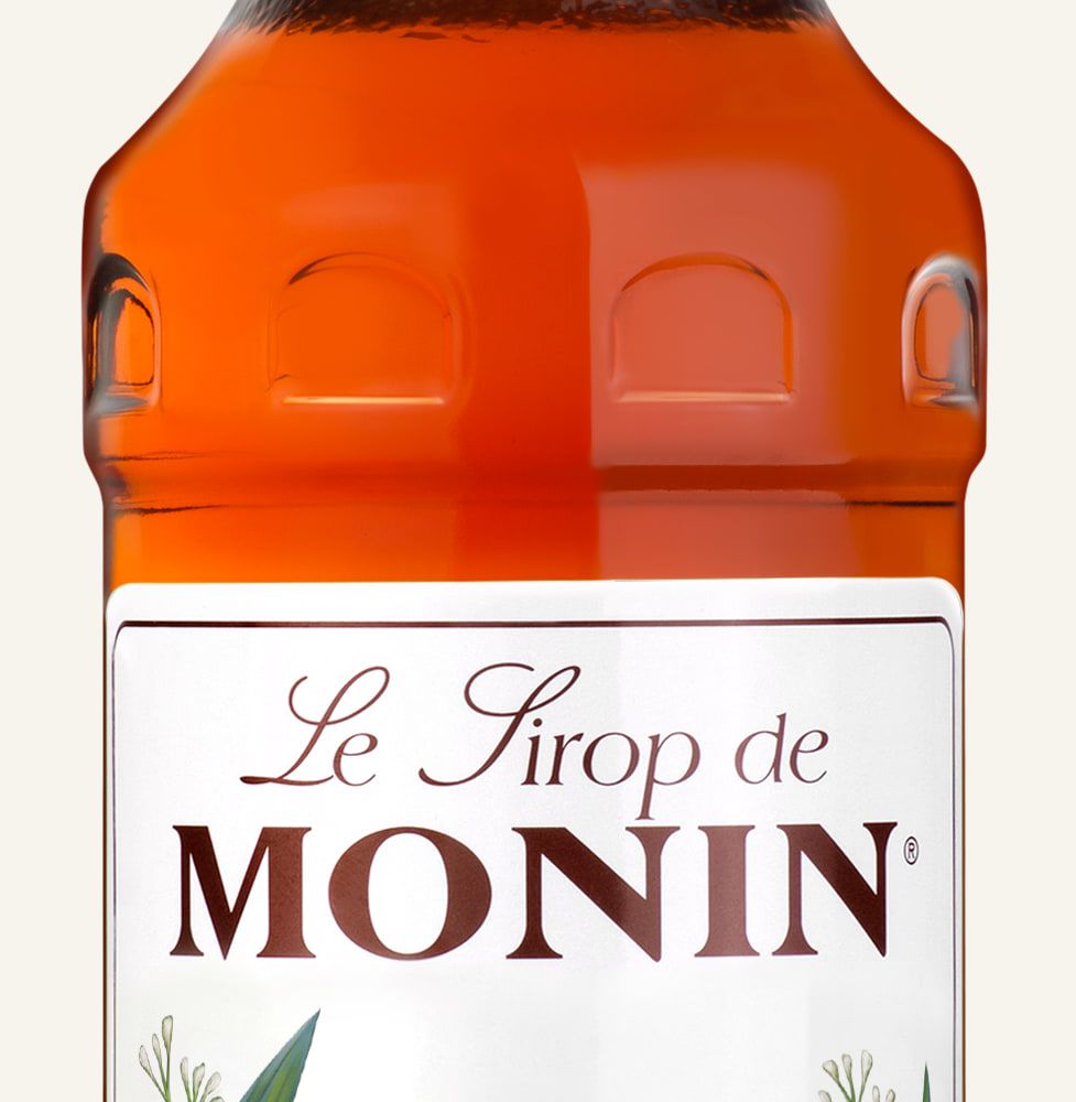 MONIN sirup Skořice 0,7l — láhev barového sirupu