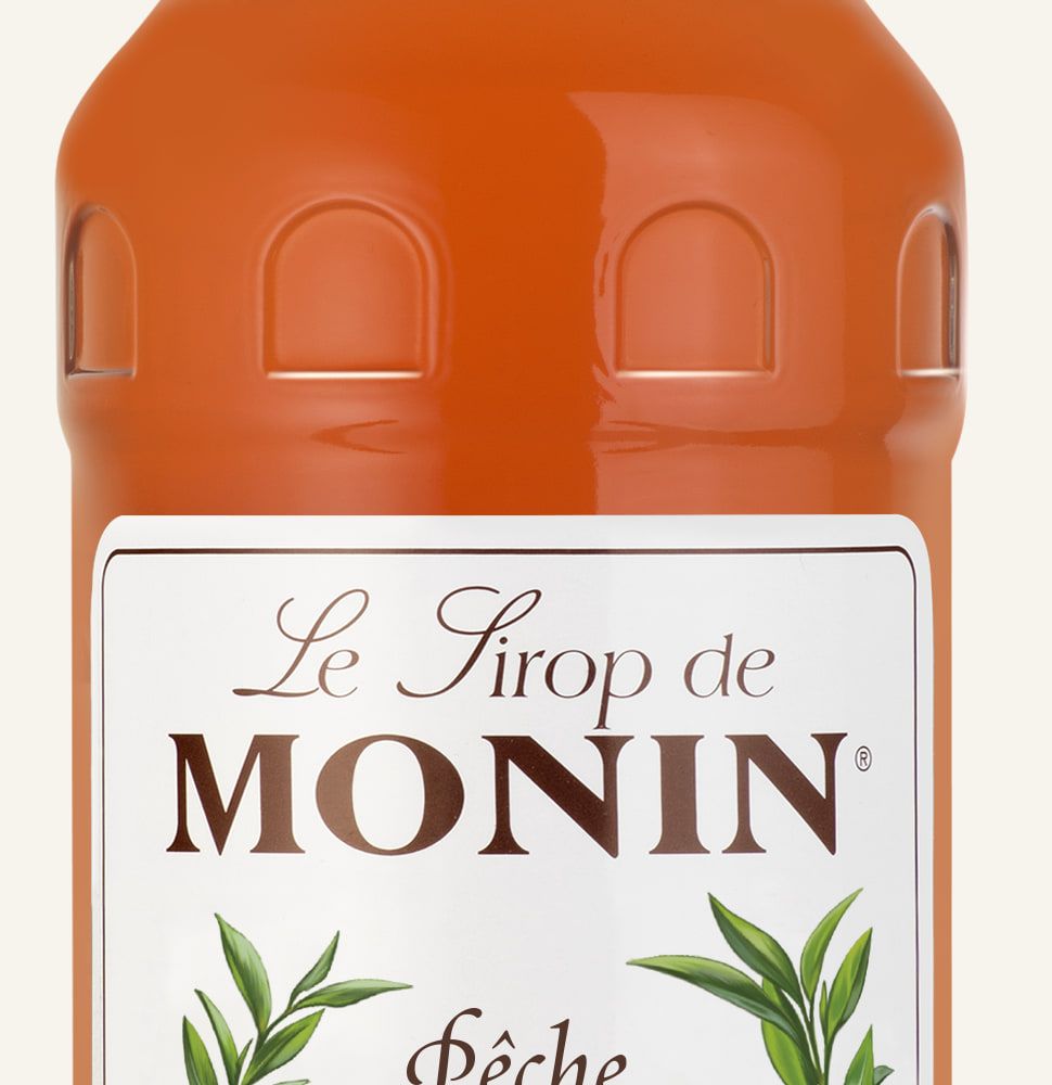 MONIN sirup Broskev 1l — láhev barového sirupu