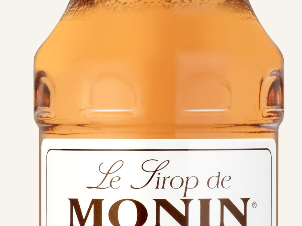 MONIN sirup Broskev 0,25l — láhev barového sirupu