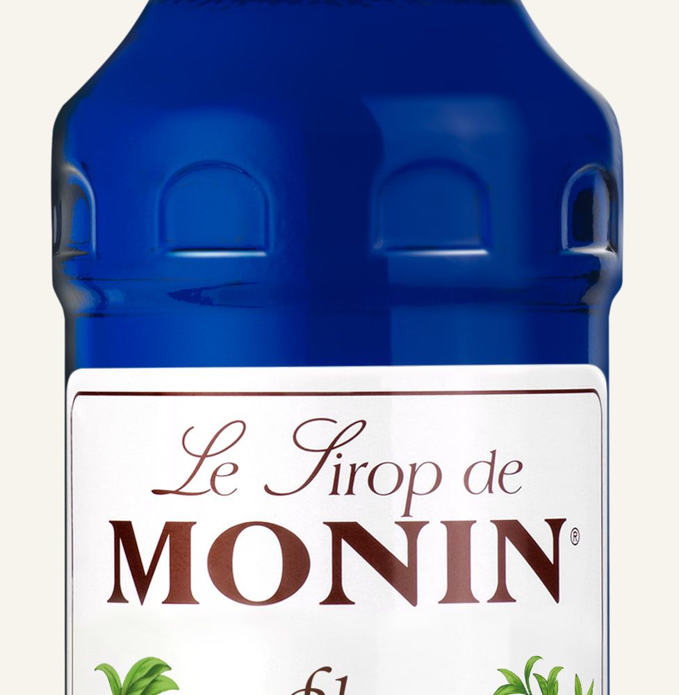 MONIN sirup Blue Curacao 0,7l — láhev barového sirupu