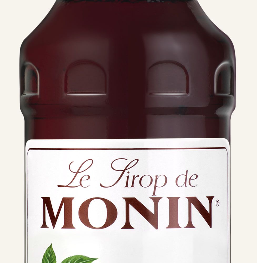 MONIN sirup Třešeň 0,7l — láhev barového sirupu
