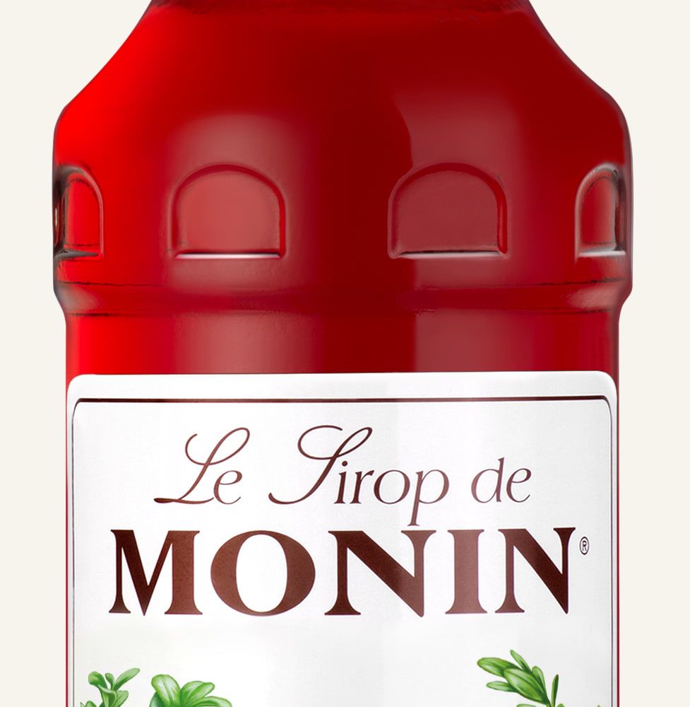MONIN sirup Brusinka 0,7l — láhev barového sirupu