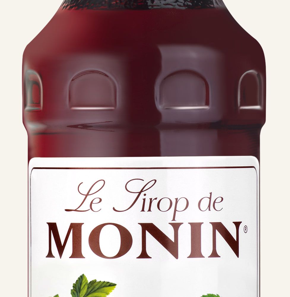 MONIN sirup Grenadina 0,7l — láhev barového sirupu