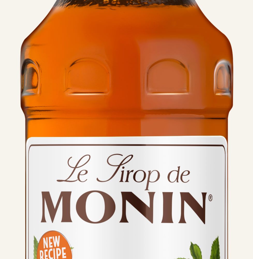 MONIN sirup Lískový oříšek 0,7l — láhev barového sirupu