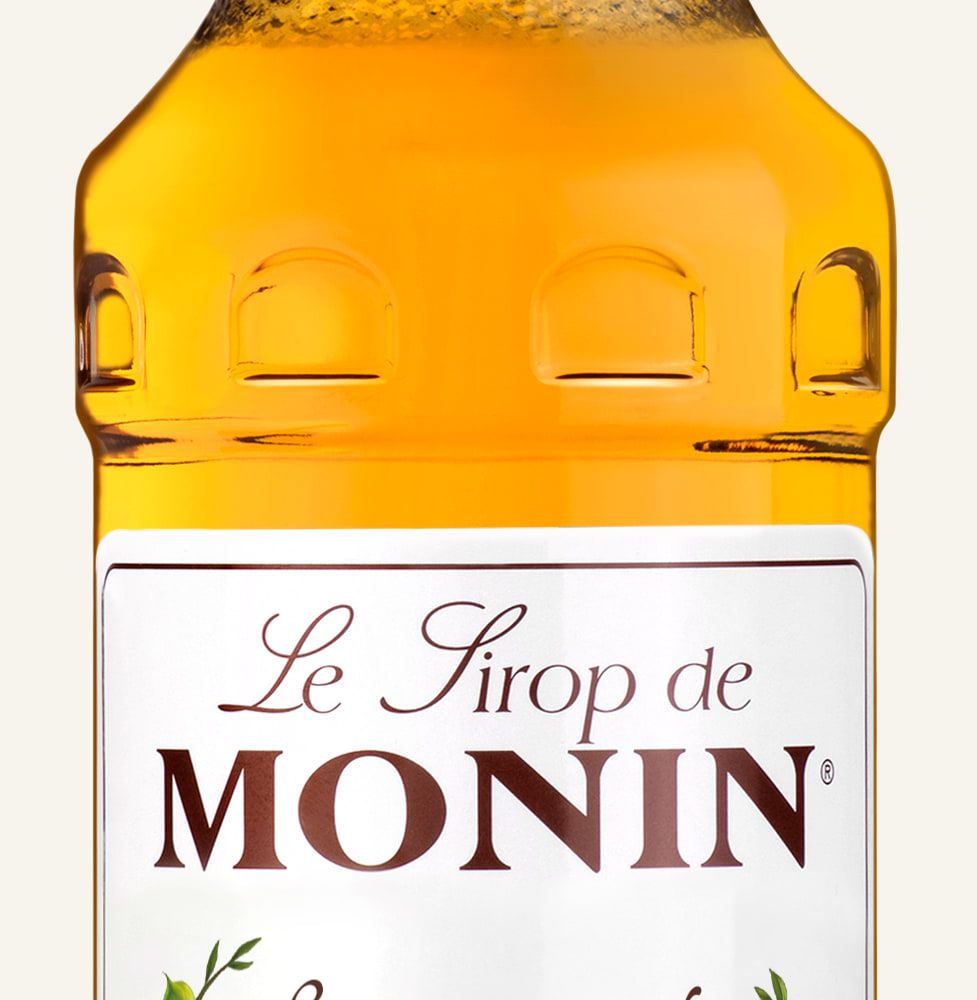 MONIN sirup Makadamový oříšek 0,7l — láhev barového sirupu