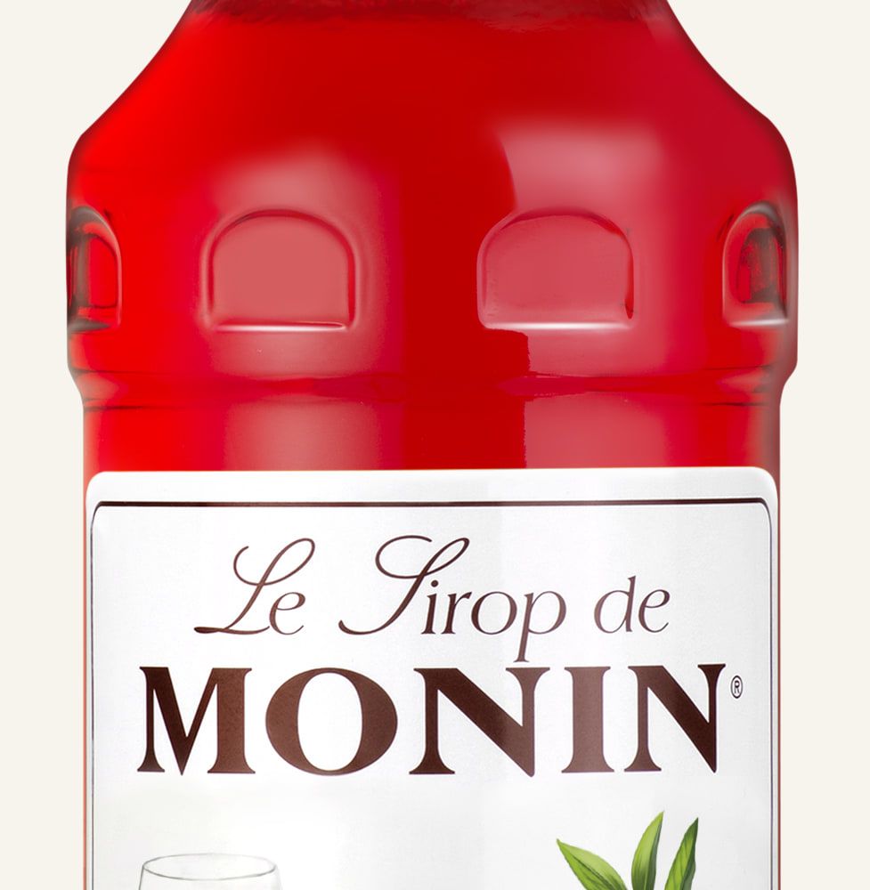 MONIN sirup Pomerančový Spritz 0,7l — láhev barového sirupu
