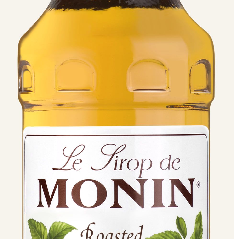 MONIN sirup Lískový oříšek pražený 0,7l — láhev barového sirupu