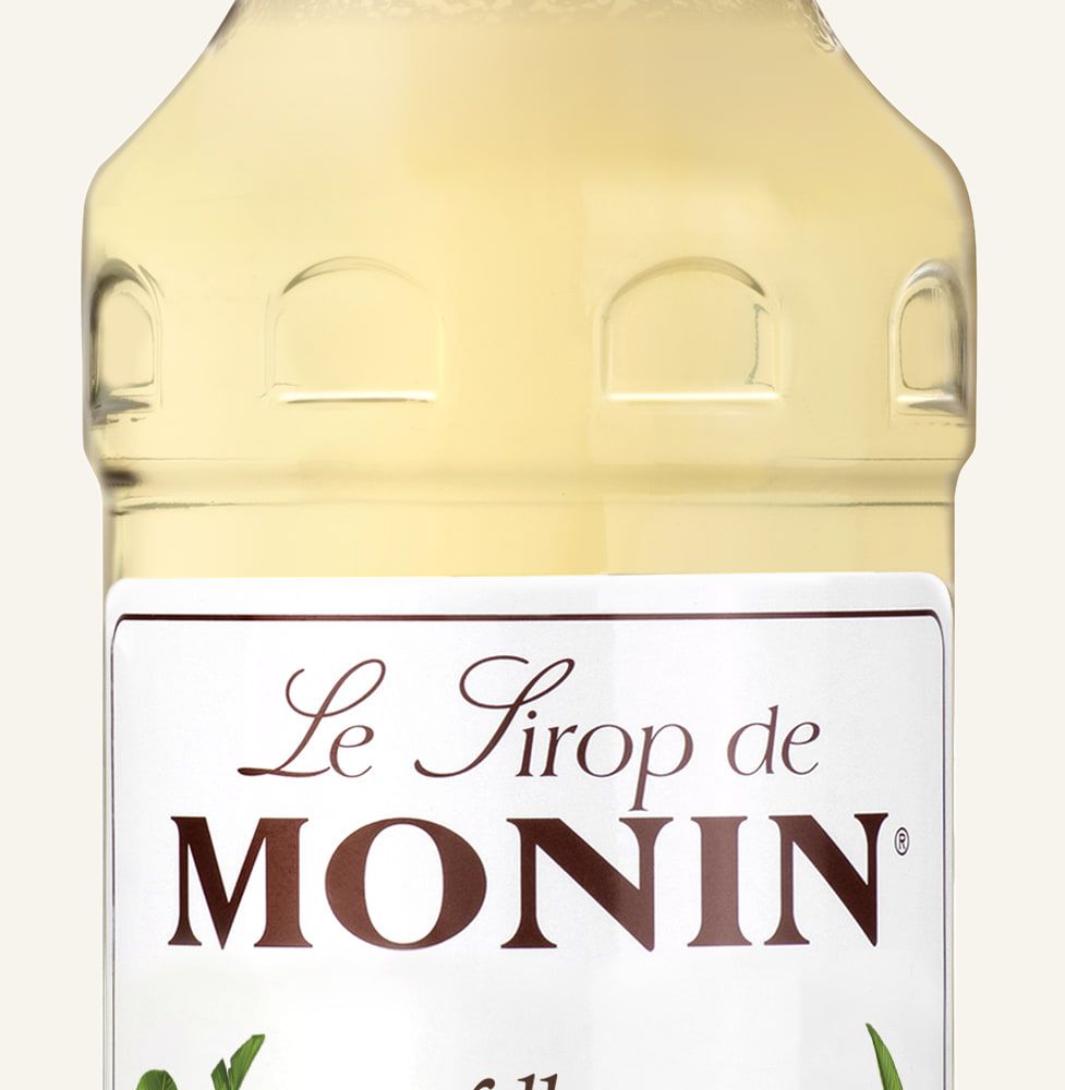MONIN sirup Banán žlutý 0,7l — láhev barového sirupu